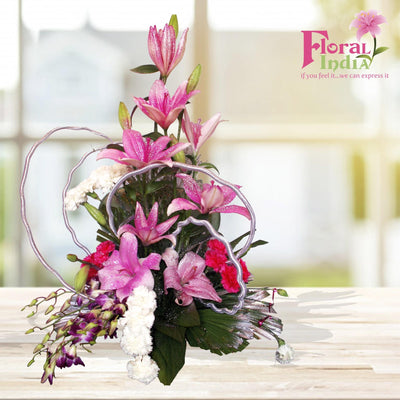 Oriental Lilies & Blue Orchids For Your Loved One