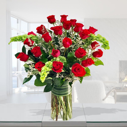 Roses On A Lush Green Bed